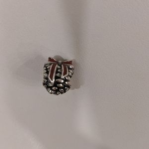 Pandora comb with red ribbon charm